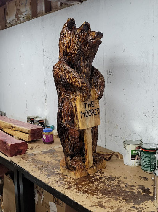 chainsaw carving bear 3ft with sign,