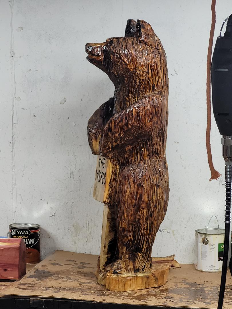 chainsaw carving bear 3ft with sign,