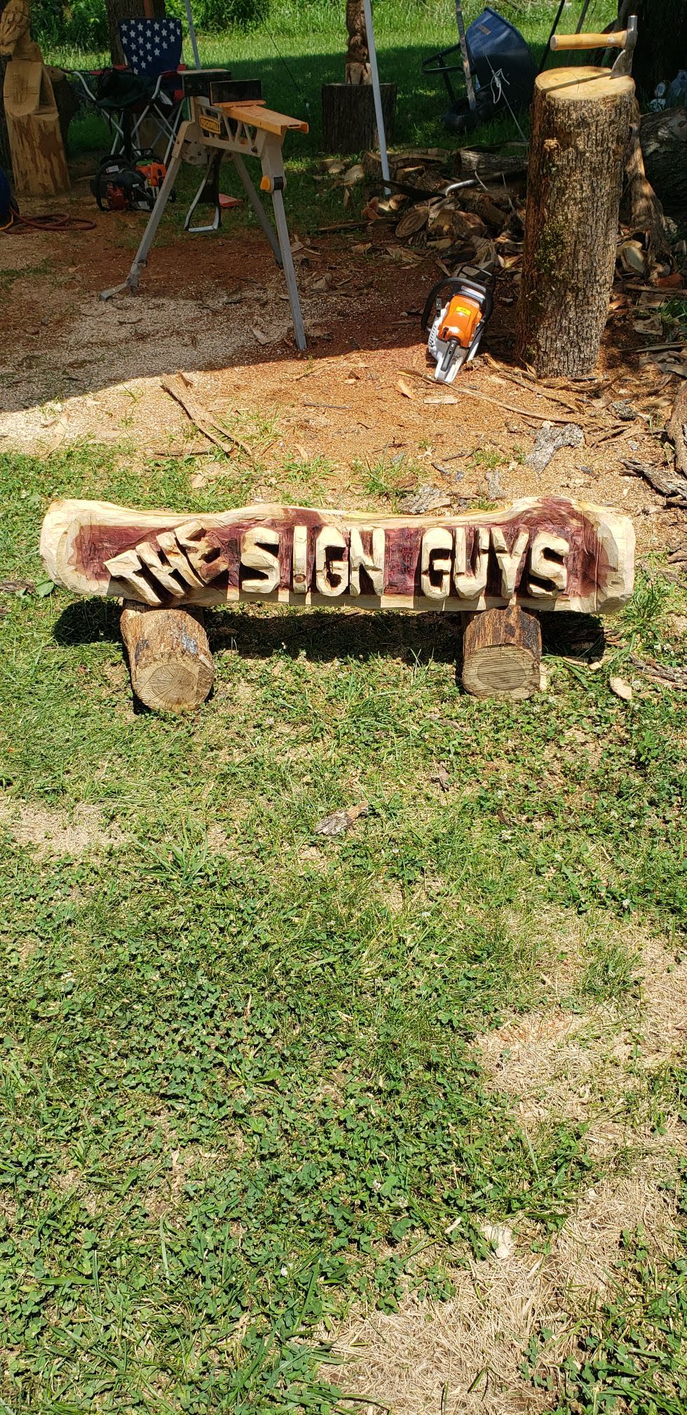 Chainsaw Carving Family Name log, woth two base logs.