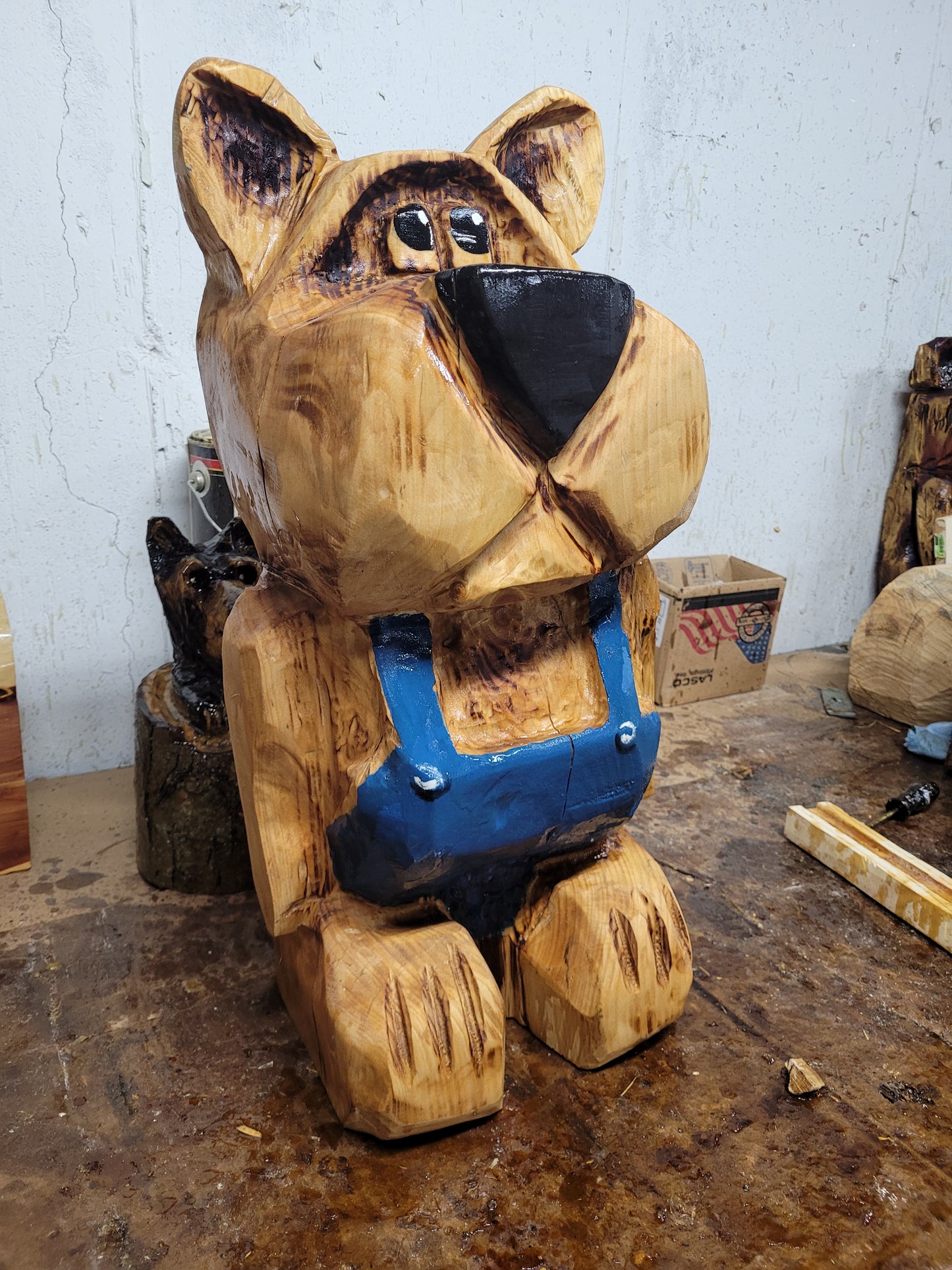 Chainsaw Carving Bear in overalls. 24 inches