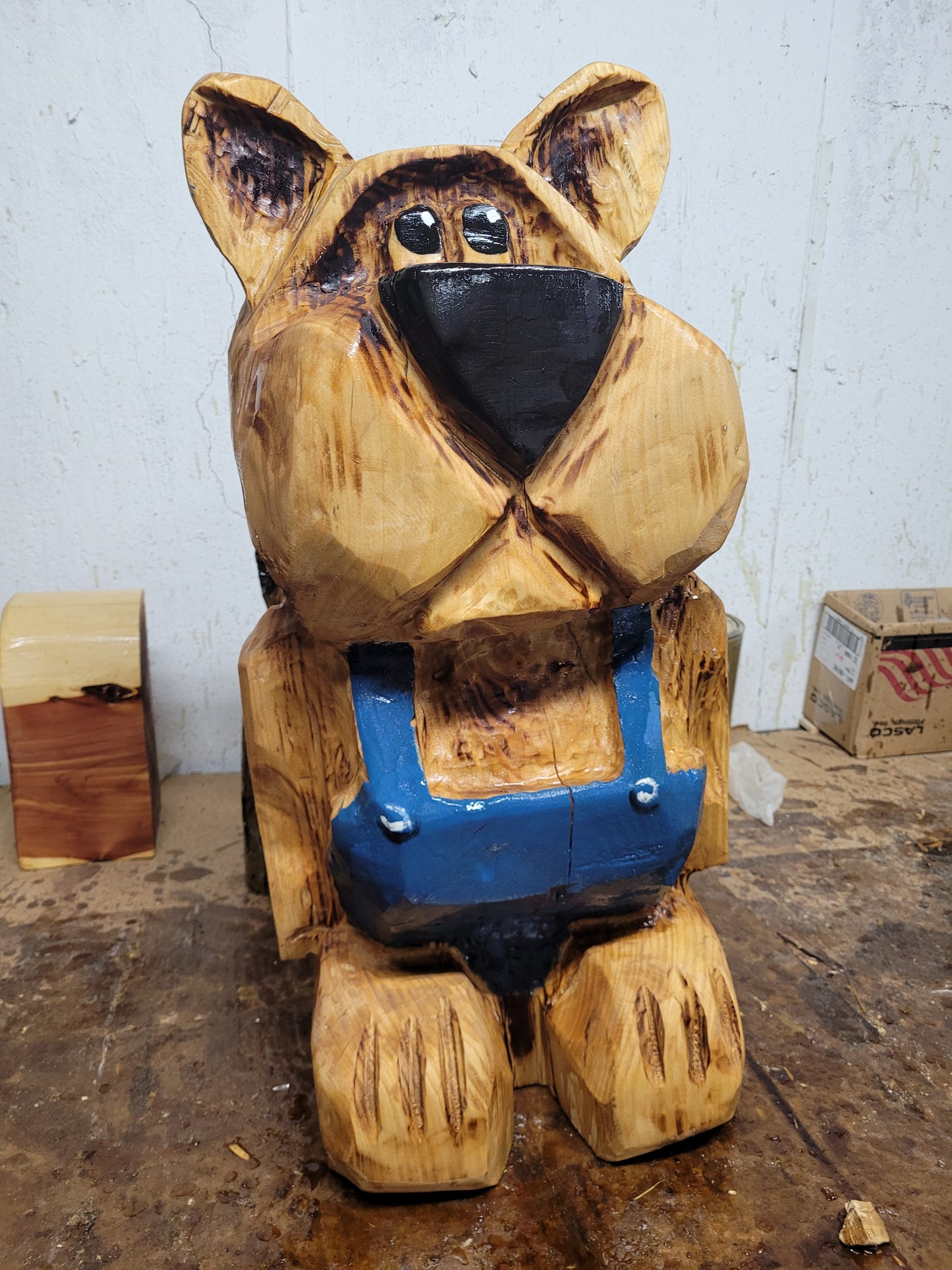 Chainsaw Carving Bear in overalls. 24 inches