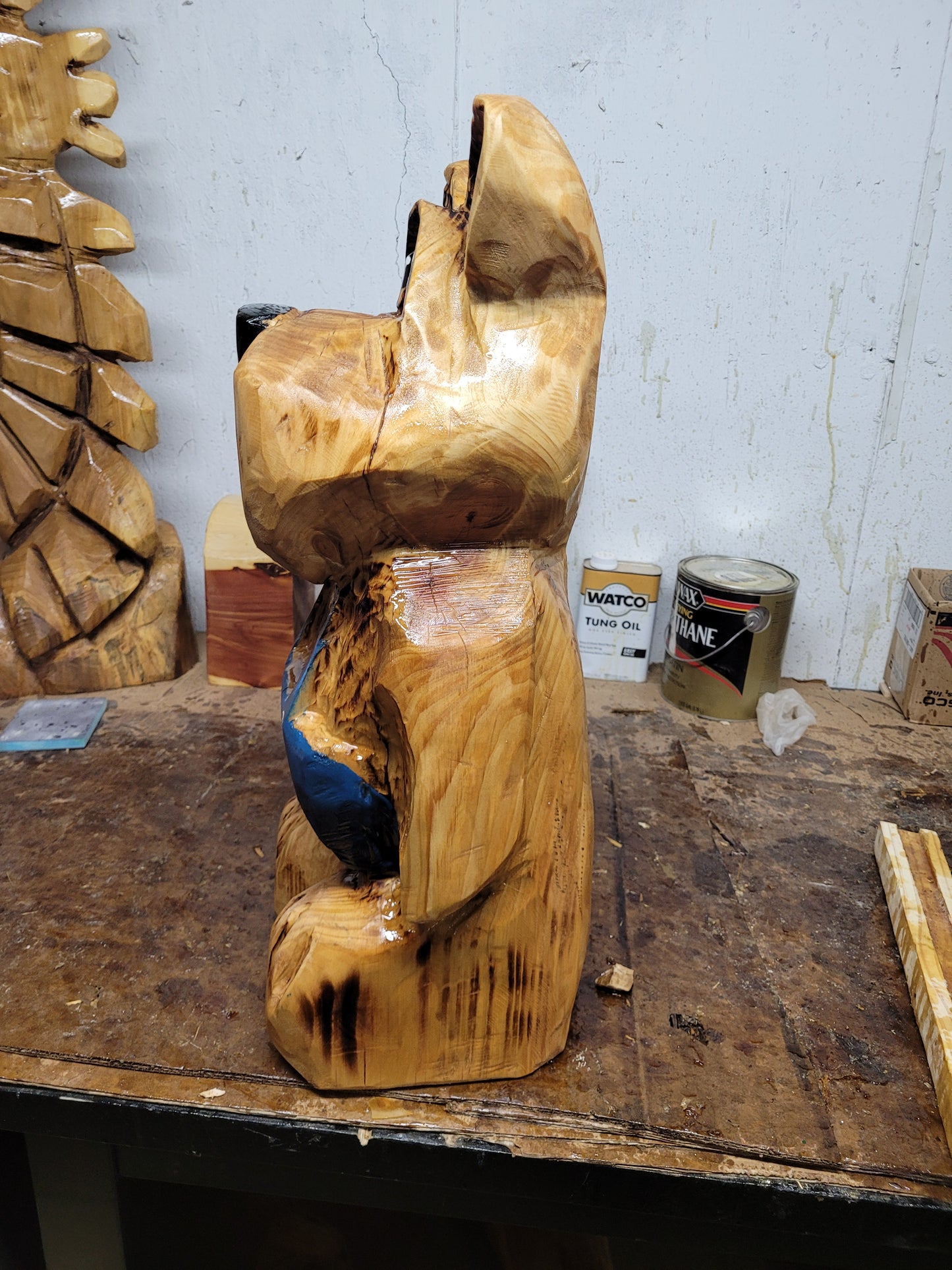 Bear in Suspenders, Chainsaw Carving. 2 ft