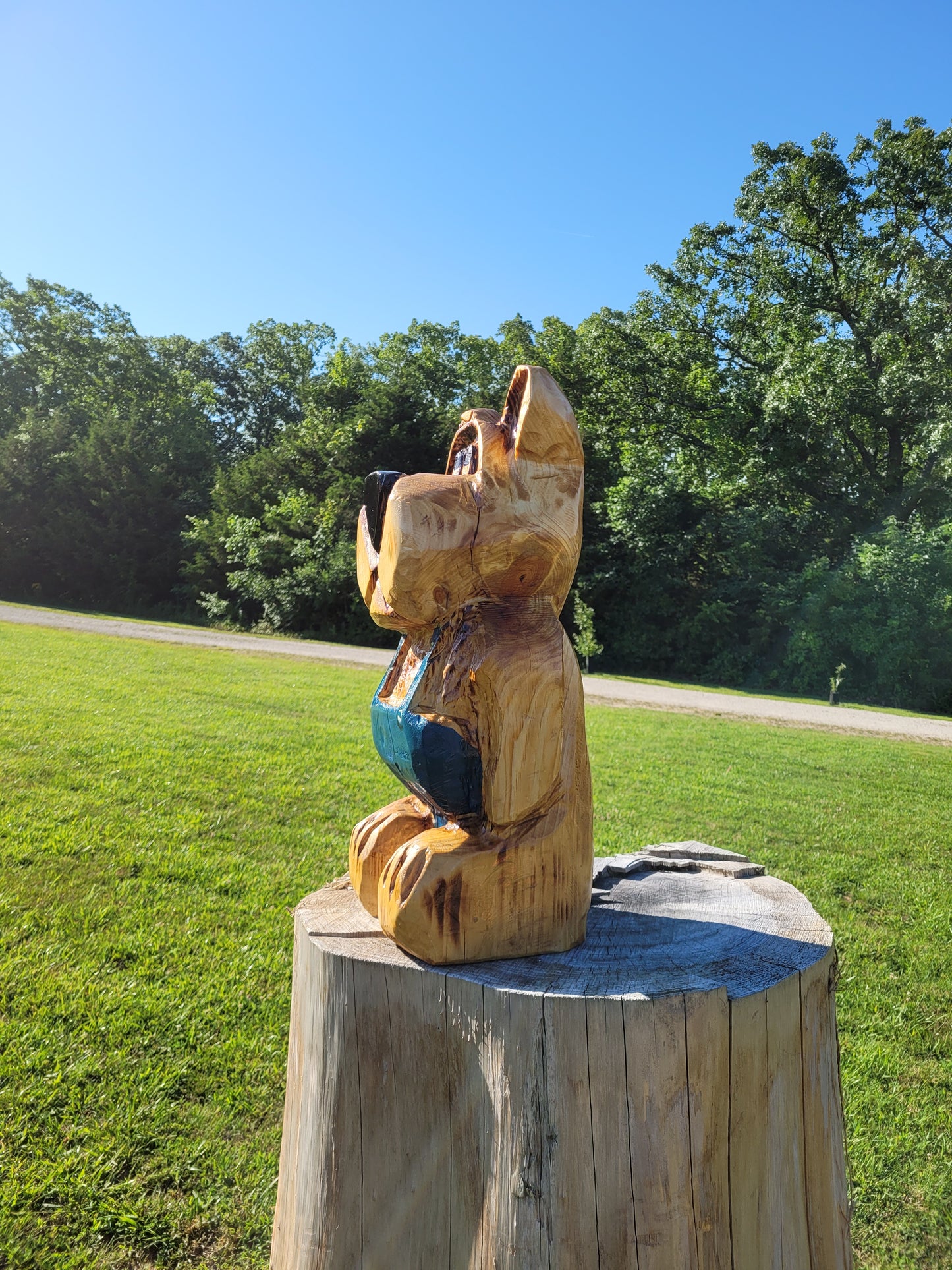 Chainsaw Carving Bear in overalls. 24 inches