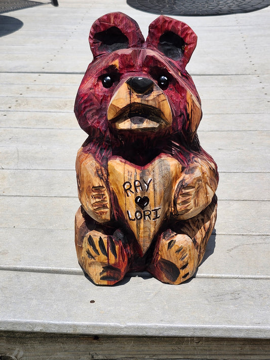 Wooden Bear holding Heart Chainsaw Carving. 18 inches tall