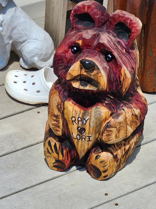 Chainsaw Carving Bear holding heart. 18" tall