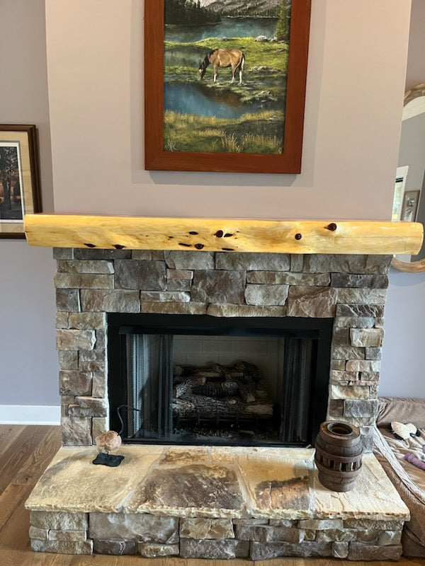 Live edge fireplace mantel. 6ft